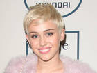Miley Cyrus slams Katy Perry over kissing...