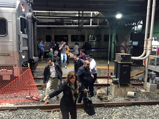 Photos: NJ commuter train crashes into station
