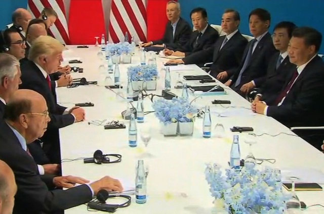 May set to collar Trump on climate change deal at G20 May set to collar Trump on climate change deal at G20