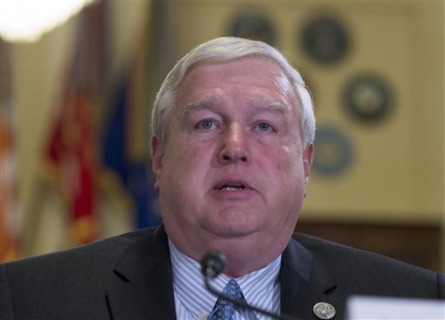 VA suspends top official in relocation scam