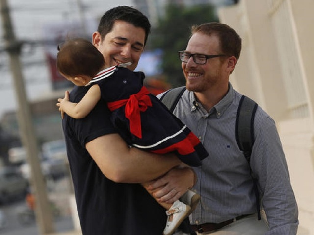 Gay Thai couple wins high-profile custody battle