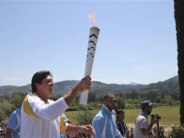 Torch begins 3-month relay through Brazil