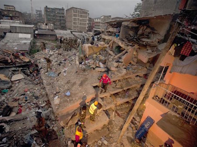 Woman found alive 6 days after building collapse