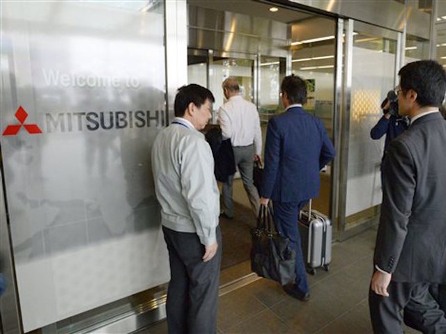 Mitsubishi Motors president to resign over scand