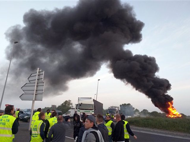Dock workers storm French port city