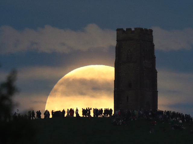 See some really great photos of the rare 'strawberry moon'