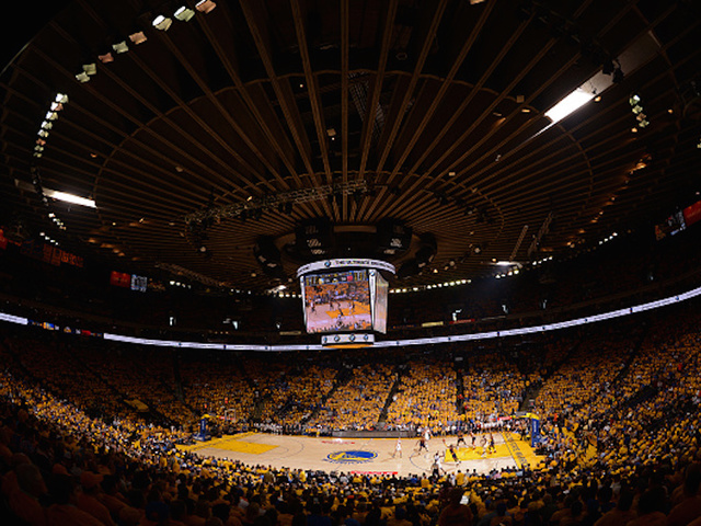 Warriors fan thrown over upper deck of arena in critical condition