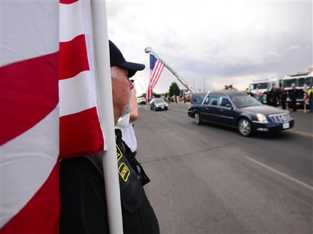 Thousands honor slain New Mexico police officer at funeral