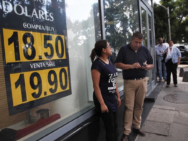 Clinton's illness cited in new plunge by Mexico peso