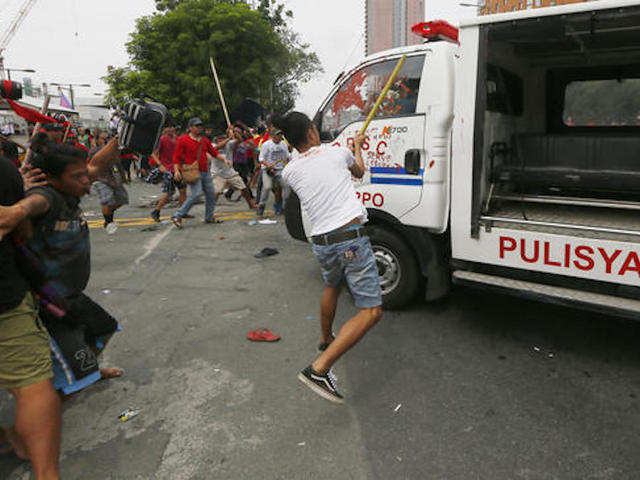 Philippine police van rams protesters in front of US Embassy