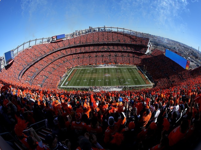 Fan dies after falling while leaving Broncos football game