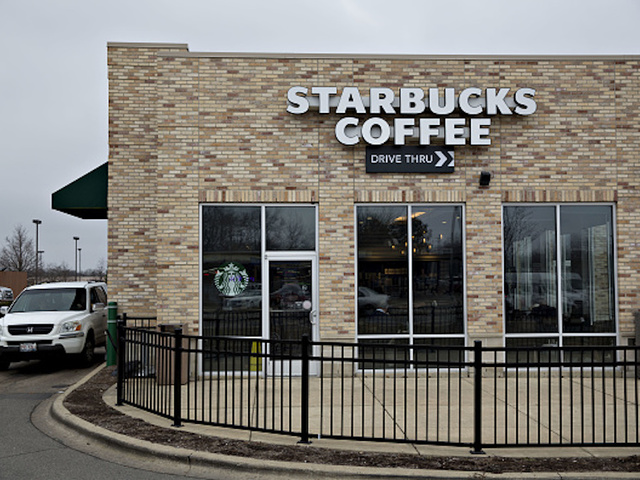 Customers boycotting Starbucks, Uber over travel ban