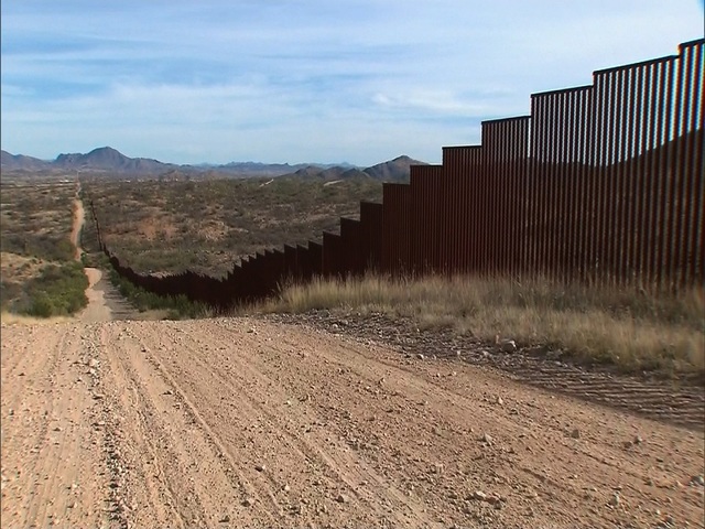 Despite big talk, Trump makes modest border wall ask
