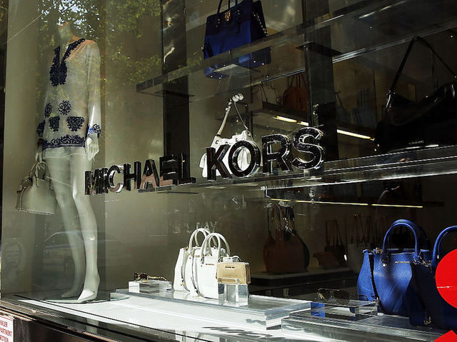 Michael Kors to close more than 100 stores