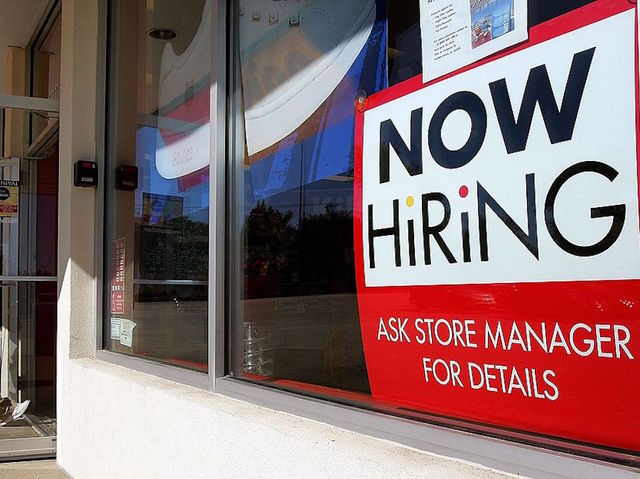 Americans are earning more per hour, and more are employed, jobs report says
