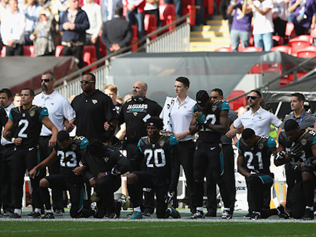 Dozens of athletes kneel during national anthem following President Trump's comments