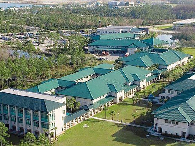 Police stand guard outside Florida university class on 'white racism'