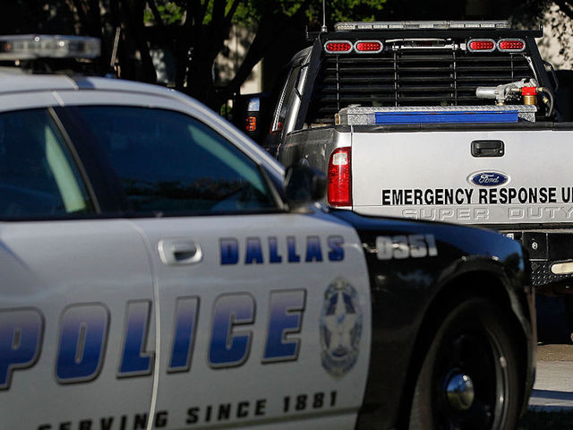 Manhunt over after 2 Dallas officers and Home Depot employee shot