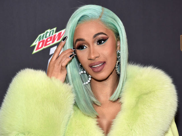 Cardi B to surrender to NYPD to face charges for strip club fight