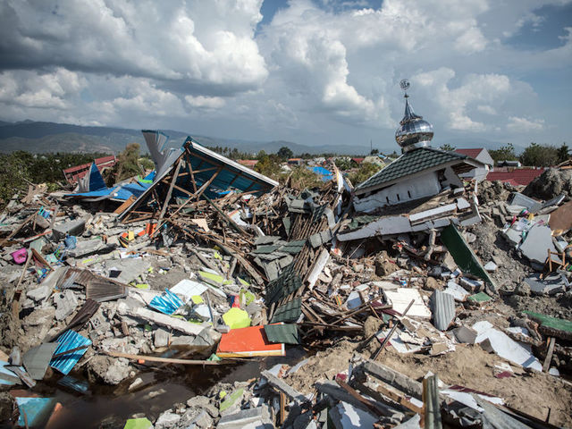 Authorities warn days left for trapped tsunami victims amid volcanic eruption