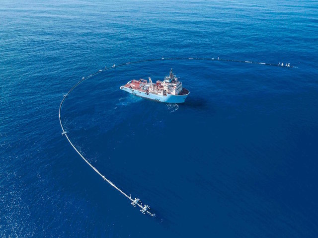 Floating pipe designed to clean up all plastic in ocean begins work today