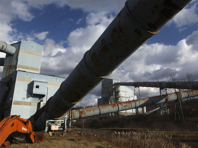 West Virginia authorities search for three people trapped in abandoned mine